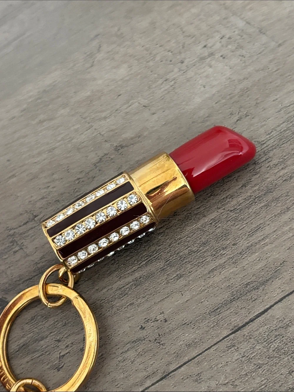 henri bendel Gold Lipstick Keychain with Red Accent
